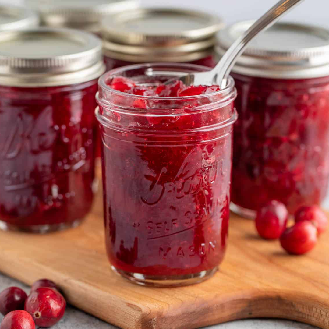 Homemade canned cranberry sauce in mason jars made in a Culinary by Hobby Hill class